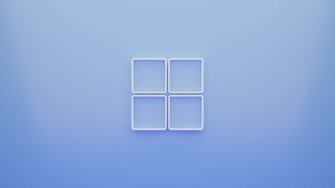 Stylized graphic representation of the Windows logo on a gradient blue background