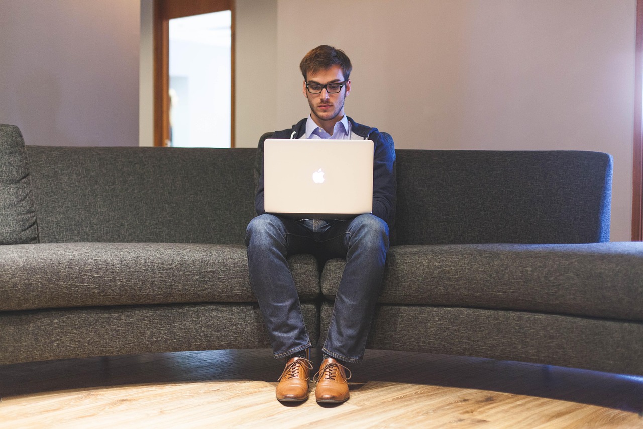 Man, laptop, businessman — Common Mistakes to Avoid During Window Installation in Kendall, FL